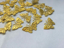 Load image into Gallery viewer, Pack of 25 gold glitter fabric butterfly embellishments, 4cm
