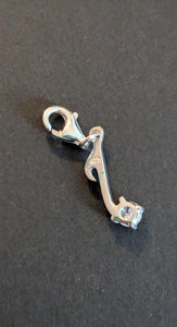 Sterling silver stamped 925 clip on charm musical note with cubic Zirconia stone.