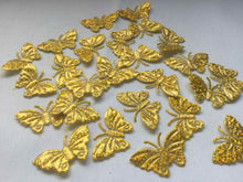 Load image into Gallery viewer, Pack of 25 gold glitter fabric butterfly embellishments, 4cm