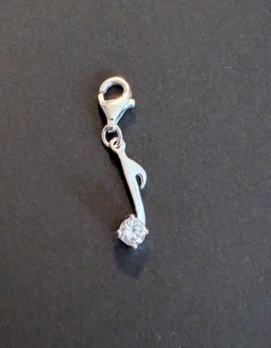 Sterling silver stamped 925 clip on charm musical note with cubic Zirconia stone.