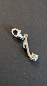 Sterling silver stamped 925 clip on charm musical note with cubic Zirconia stone.
